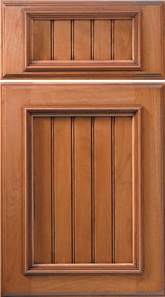 the front and back doors of a kitchen cabinet with wood grained panels on each side