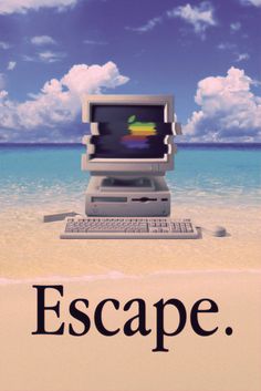 an old computer sitting on top of a beach with the words escape written below it