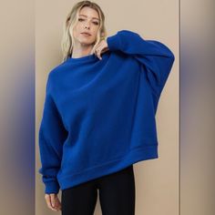 Round Neck, Oversized Sweatshirt With Dropped Shoulder. Amazingly Soft And Feels So Good! 50% Cotton, 50% Polyester Model Height: 5’8.5”; Dress Size: 2; Bust: 34”; Waist: 24”; Hips: 34” Relaxed Blue Long Sleeve Top, Blue Oversized Top With Drop Shoulder, Oversized Blue Drop Shoulder Sweatshirt, Blue Relaxed Fit Sweatshirt, Oversized Blue Long Sleeve Sweatshirt, Blue Oversized Cotton Sweater, Oversized Blue Cotton Sweater, Blue Relaxed Fit Drop Shoulder Top, Trendy Blue Drop Shoulder Tops