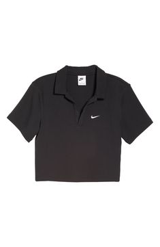 This trim stretch-jersey polo ups the stakes in the style game with a cropped profile and a button-free placket. 18" length (size Medium) Half placket Spread collar Short sleeves 97% cotton, 3% spandex Machine wash, tumble dry Imported Nike Sporty Short Sleeve Polo Shirt, Crop Polo Shirt, Black Polo Collar Sports Top, Black Cropped T-shirt For Sports, Polo Outfits For Women, Polo Crop Top, Nike Polo, Polo Outfit, Black Crop