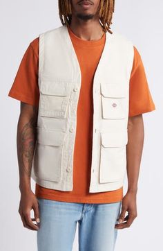 Bring lots of extra pockets to any outing in this vest made of durable cotton with a lining of breathable mesh and a fit that's easy to layer. 27" length (size Medium) Front button closure Chest and front flap-bellows pockets Mesh lining 100% cotton Machine wash, tumble dry Imported Casual Streetwear Vest With Functional Pockets, Everyday White Cotton Vest, Functional Cotton Vest For Spring, Functional Spring Vest With Pockets, Spring Functional Vest With Pockets, Spring Functional Cotton Vest, Utility Streetwear Vest With Patch Pockets, Utility Vest With Patch Pockets For Streetwear, Casual Outdoor Vest With Patch Pockets