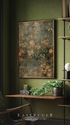 a painting hanging on the wall next to a chair and table with plants in it