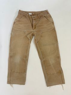 Vintage tan double knee carhartt work pants Worn-in lightly distressed condition, see photos. Women's - tag size: 8 x 34 Measured size: 30" waist 40" hip 20" thigh a thickest point 25" inseam Women Carhartt, Carhartt Work Pants, Carhartt Double Knee Pants, Double Knee Pants, Carhartt Double Knee, Work Pants Women, Womens Trousers, Knee Pants, Vintage Carhartt