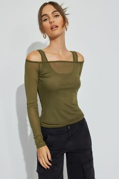 This top is absolute baddie mode. The layering options... our heads are spinning. Features - Layered Construction - Off-the-shoulder neckline - Fixed shoulder straps at underlay - Sheer mesh Size & Fit - Fit: Fit and stretch - Length: Cropped - Model is wearing size S Materials & Care - Content: 90% polyester, 10% spandex - Care: Machine wash, cold - Imported Layered Mesh Top Outfit, Mesh Top Outfit, Layered Crop Top, Long Sleeve Tops For Women, One Shoulder Shirt, Outfits 2000s, Black Mesh Top, Work Uniform, Mesh Long Sleeve Top