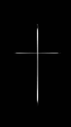 a cross is shown in the middle of a black background