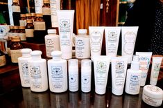 many different types of skin care products on a table