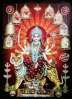 the hindu goddess sitting on top of a tiger and surrounded by hanging lamps, with her arms outstretched