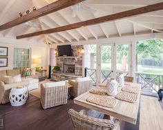 a living room filled with furniture and a fire place