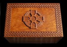 a wooden box with an intricate design on it