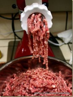 the ground beef is being prepared to be cooked