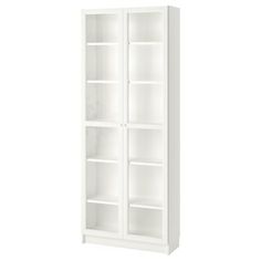 an empty white bookcase with shelves on each side