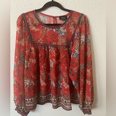 Woman’s Xl Red Floral Blouse. Never Worn Fall Flowy Red Blouse, Flowy Red Blouse For Fall, Chic Flowy Red Blouse, Chic Red Flowy Blouse, Red Bohemian Fall Blouse, Red Flowy Bohemian Blouse, Flowy Red Bohemian Blouse, Red Flowy Tops For Fall, Flowy Red Tops For Fall