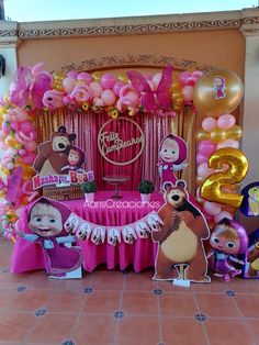 a birthday party with balloons and decorations