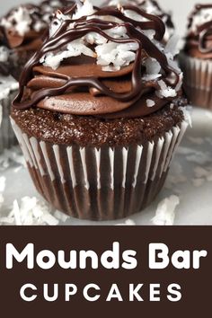 chocolate cupcakes topped with whipped cream and chocolate frosting