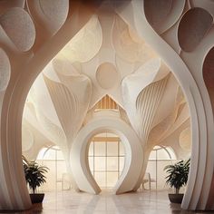 the interior of a building with large white columns and plants in pots on the floor