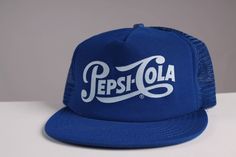 VTG PEPSI Cola 80's 90's Mesh SnapBack Hat Cap Trucker Puffy Blue white Blue mesh snap back with puffy emblem front. new old stock, never worn, flat brim. Very good vintage condition. one size fits all foam is bad but still wearable Please ask questions before purchasing, all sales final. Blue Retro Trucker Hat For Streetwear, Retro Blue Trucker Hat For Streetwear, Vintage Blue Snapback Hat For Streetwear, Retro Blue Cap Hat, Retro Blue 5-panel Trucker Hat, Retro Blue Cap, Blue Retro Cap, Blue Retro Baseball Cap For Streetwear, Retro Blue Baseball Cap For Streetwear