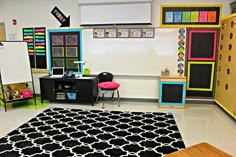 a black and white area rug in a classroom