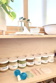 the shelves are filled with different types of body scrubs and other items on them