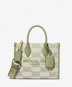 ⚛️100% Authentic Guarantee ⚛️ 👜Michael Kors Mirella Small Logo Jacquard Crossbody Bag 🎁Condition is New with tags.  🍒Color: Light Sage 🌿DESIGN Whether you're touring a new place, headed to a birthday picnic, or simply out and about, the Mirella will meet the moment. Fit all your essentials into this charming mini tote, which can be carried by the top handles or worn cross-body thanks to a removable strap. Cut from sturdy jacquard canvas that features our "MK" initials, it's a reliable way to Michael Kors Handbags Crossbody, Birthday Picnic, Bag Logo, Luxury Bags Collection, Handbag Essentials, Michael Kors Handbag, Michael Kors Tote Bags, Girly Bags, Mk Bags