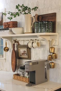 Close to six months into this kitchen renovation, we’re finally at the finishing steps, which includes making this DIY cottage peg rail shelf that gives me at least one little finished corner of the room to look at and see progress. It’s the perfect addition to an otherwise blank wall and it adds some functional but aesthetic storage. The best part? The materials only cost about $65 and it was a one-day project. Shaker Peg Shelf Kitchen, Coffee Station Kitchen Countertops, Wall Coffee Station, Vintage Decorating Ideas, Model Dapur, Coffee Stations, Kitchen Shelf Decor, Vintage Decorating, Coffee Bar Home