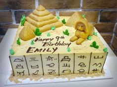 a birthday cake made to look like an egyptian pyramid