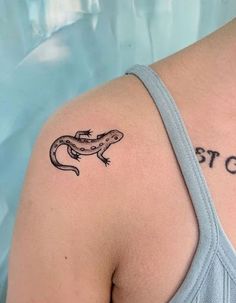 a woman's arm with a tattoo on it that reads, stop to eat