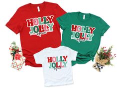 IMPORTANT  Impress your friends with these Holly Jolly Squad family Christmas t-shirts!  These are perfect matching shirts for family photos, Christmas pajama shirts, a Christmas party, or a fun Christmas outing!  These Red and Green Christmas shirts can be worn all as one color or with a mixture of colors! White and Natural colors have no white border around the text.  Red, Green, and Gray colors have white around the text to make it stand out from the shirt color.  ABOUT THE SHIRT - UNISEX ADULT  This classic unisex jersey short sleeve tee fits like a well-loved favorite. Soft cotton and quality print make users fall in love with it over and over again. These t-shirts have-ribbed knit collars to bolster shaping. The shoulders have taping for better fit over time. Dual side seams hold the Christmas Pajama Shirts, Group Christmas Shirts, Family Photos Christmas, Family Christmas Shirts, Group Photo, Fun Christmas, Crew Shirt, Pajama Shirt, Holiday Shirts