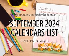 a desk with a calendar and pencils next to it, on top of a wooden table