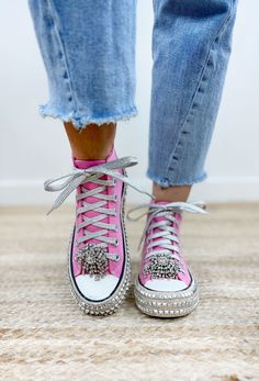 Make a statement in these so cool high-top sneakers featured in an edgy, distressed design with a studded sole and metallic detailing. These will instantly become your new go-to sneakers. If width is a concern or you are between sizes, we recommend sizing up half a size. Cool High Tops, Pink Sneakers, Custom Patches, Fall Shoes, Trending Accessories, High Tops, High Top Sneakers, Jumpsuit Romper, Top Outfits