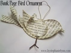 a book page bird ornament made out of paper