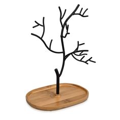 PRICES MAY VARY. TREE DISPLAY: Show off and organize your collection of accessories with the Navaris jewelry stand. The organic tree shape will add a natural touch of whimsy to your bedroom or dressing room. ACCESSORIES ORGANIZER: The sturdy metal "branches" provide the perfect place to hang and hold various sizes of necklaces, bracelets, rings, earrings and watches. The bamboo base doubles as a jewelry dish to hold ear studs and other loose trinkets. PRODUCT DETAILS: Dimensions W x D x H - 7.1" Tree Jewelry Displays, Wooden Jewellery Tree, Handmade Wire Jewelry Stand, Wood Branch Jewelry Holder, Wooden Jewelry Tree, Jewelry Tree Stand, Jewelry Organizer Stand, Necklace Stand, Jewelry Hanger