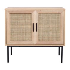 a wooden cabinet with wicker doors and black legs