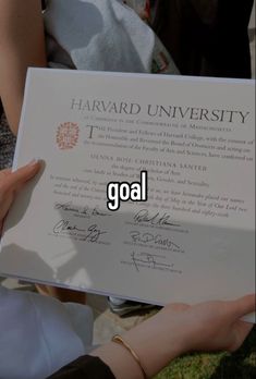 someone is holding up a certificate that says, harvard university i'm going to graduate