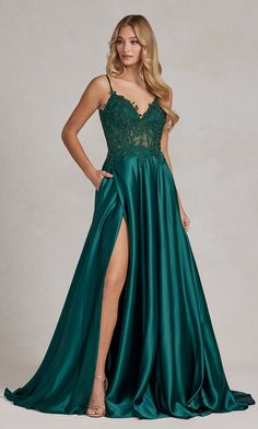 Step out in this long a-line prom dress that offers a traditional look with a modern vibe. The beautiful a-line evening gown sparkles with a sheer beaded-lace bodice that has a deep v-neckline and thin shoulder straps that lead to the v-back. The dazzling long formal dress has a faux-wrap long a-line skirt that opens in a side slit before angling away from the hips before cascading down to the floor. Offered in misses and extended sizes, this glamorous long a-line prom dress is surprisingly unde Special Ocassion Dresses, Long A Line Skirt, Dress With Corset, Stunning Prom Dresses, Prom Long, Occasion Dresses Wedding, Embroidered Bodice, Formal Party Dress, A Line Prom Dresses