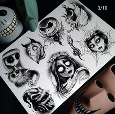 a sheet of paper with various faces on it next to a mask and other items