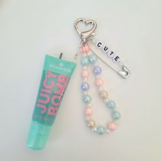 diy lipgloss keychain with beads, letter beads and heart shaped clip Lipgloss Keychain Diy, Lip Gloss Keychain Diy, Lipgloss Keychain Ideas, Stanley Charms Diy, Lipgloss Keychain, Pinterest Diy, Diy Lip Gloss, Bead Charms Diy