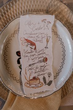 a place setting with a menu on it