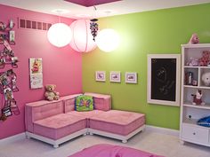 a child's bedroom decorated in pink and green