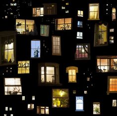 many windows are lit up in the dark