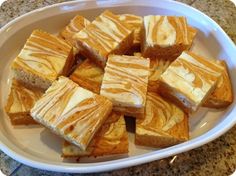 a plate with some food on it and the caption reads pumpkin cream cheese bars