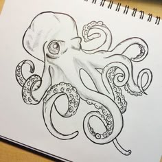 an octopus drawing is shown on a piece of paper