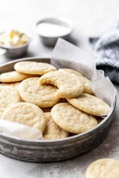 some cookies are in a tin on a table