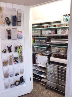 an organized pantry with bins, baskets and other items on the shelves next to it