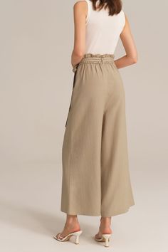 Experience the perfect blend of comfort and style with this casual elastic waist wide leg pants. This pants are designed for versatility and effortless elegance, making them a must-have for any casual occasion. Embrace a relaxed and chic look that is both comfortable and fashion-forward.Material : 75%Viscose+25%LinenElasticity : NoneSku : CL2814S24*Package : 1*PantsCare instructions:Do Not Bleach.Separate dark colors.Iron Low Heat. Casual Non-stretch Khaki Wide Leg Pants, Versatile Ankle-length Pants For Spring, Casual Beige Wide Leg Pants, Loosely Fitted Hips, Versatile Solid Culottes For Spring, Khaki Wide Leg Cargo Pants, Chic Wide Leg Pants With Elastic Waistband For Spring, Wide Leg Pants With Elastic Waistband For Day Out, Versatile Wide-leg Pants With Tie Waist, Spring Khaki Loungewear Pants