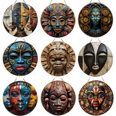 six african masks hanging from strings in different colors and designs, each with an individual's face