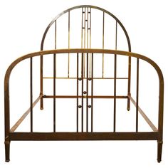 a metal bed frame with four posts and two headboards on each side, against a white background