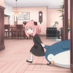 an anime character with pink hair and black dress holding onto a penguin in a living room