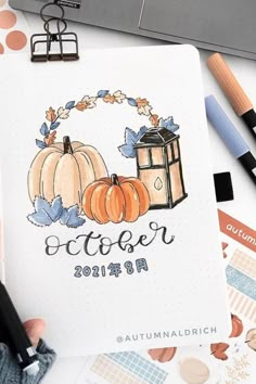 a person is holding a pen and looking at a paper with the words october written on it