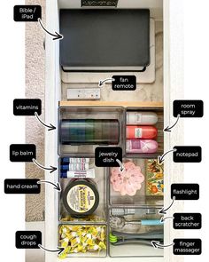 the contents of an organized drawer with labels on it and instructions to put them in