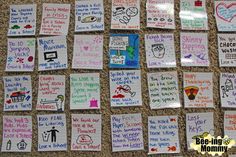 a bulletin board covered in lots of different types of notes and magnets on it